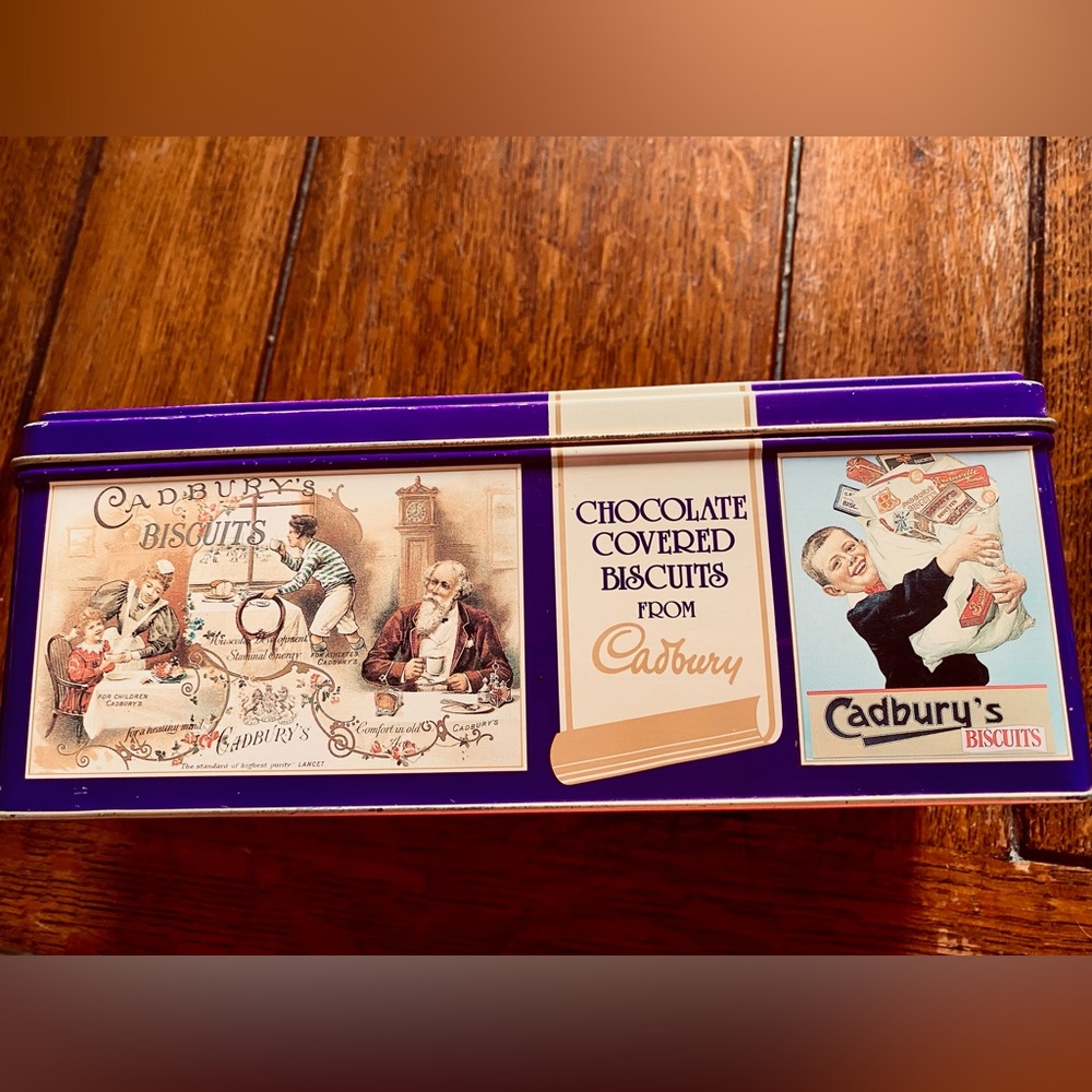 Vintage Cadbury Tin made in England. Colors are vibrant, accurate as phone allow